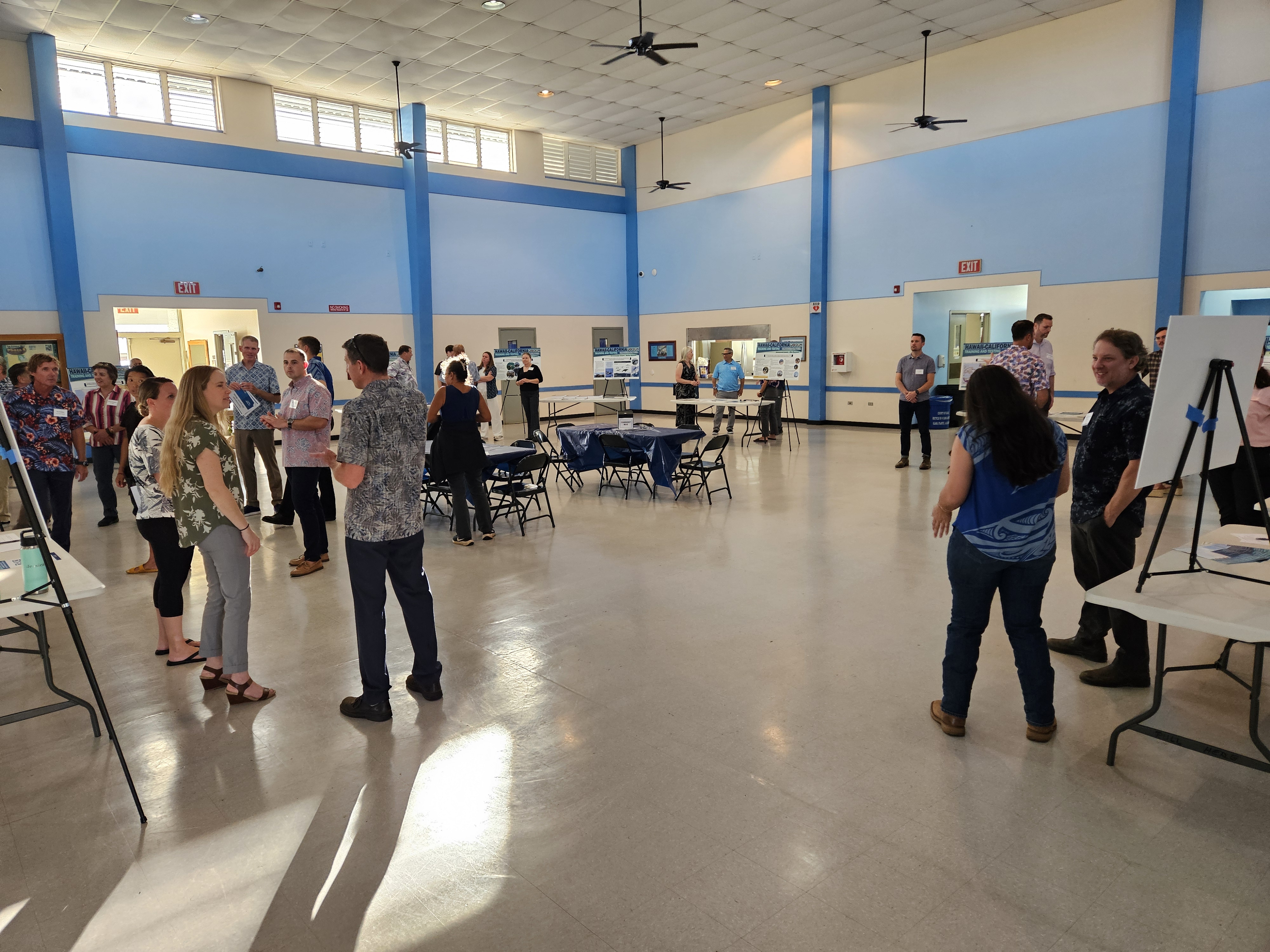 This is an image of an open-house public meeting hosted by the United States Navy.